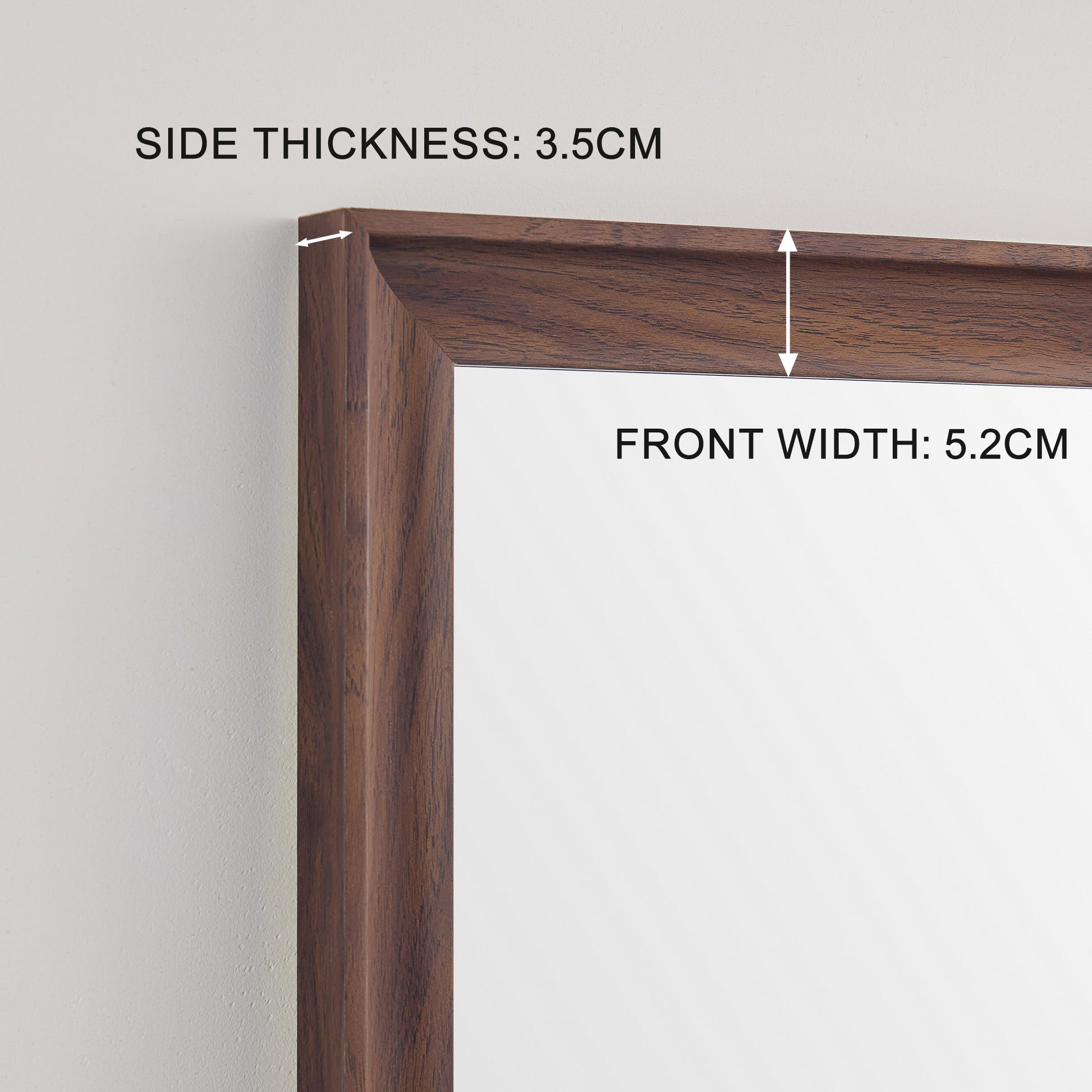 Closeup of a dark woodgrain mirror frame showing cm side thickness detail