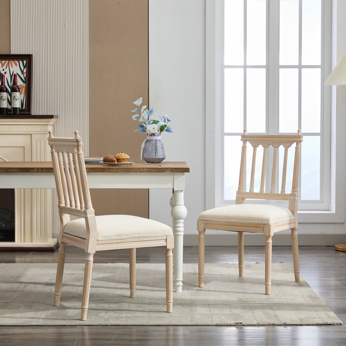 Light oak dining chair with carved legs and cream upholstered seat
