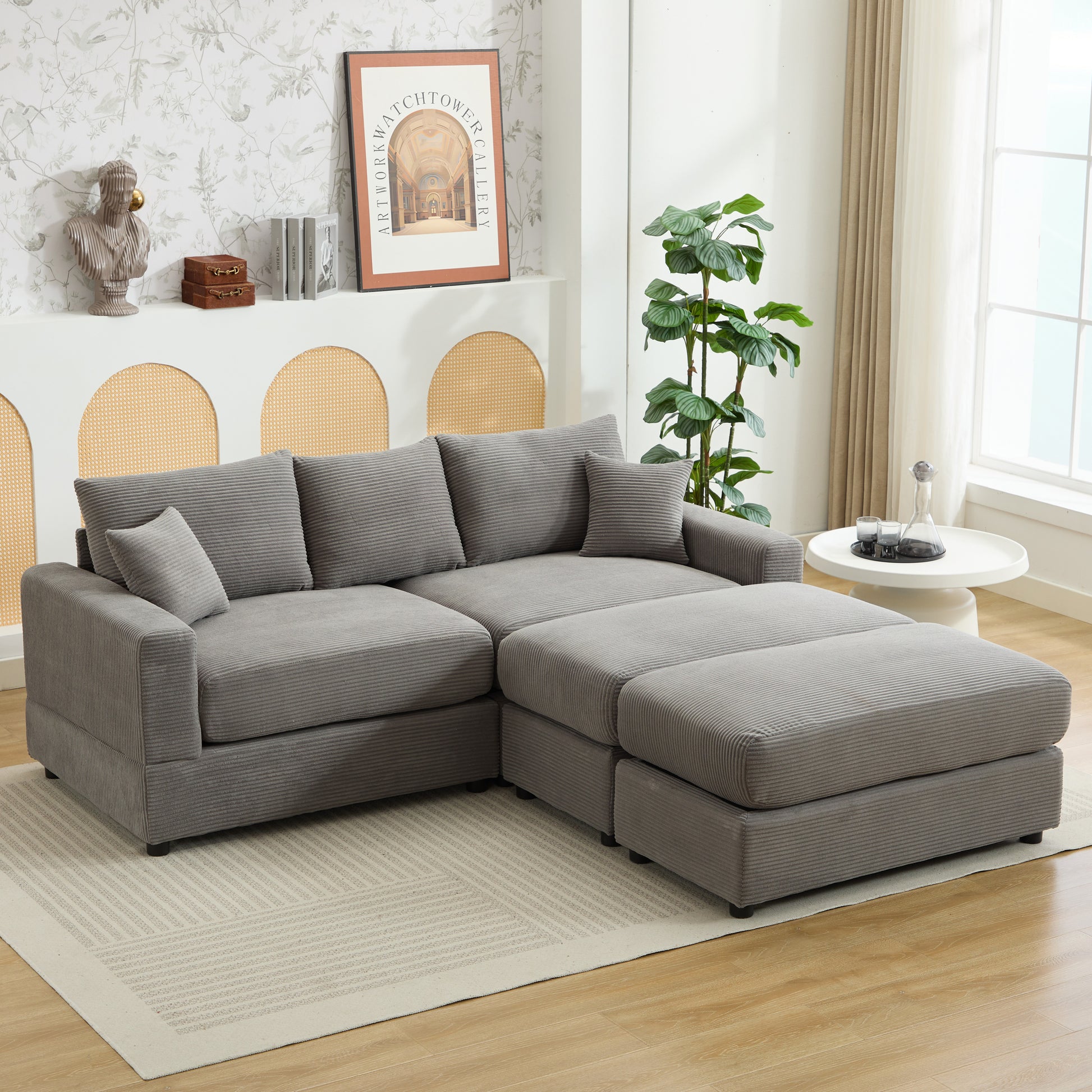 Gray corduroy sectional sofa with ottoman and plush throw pillows