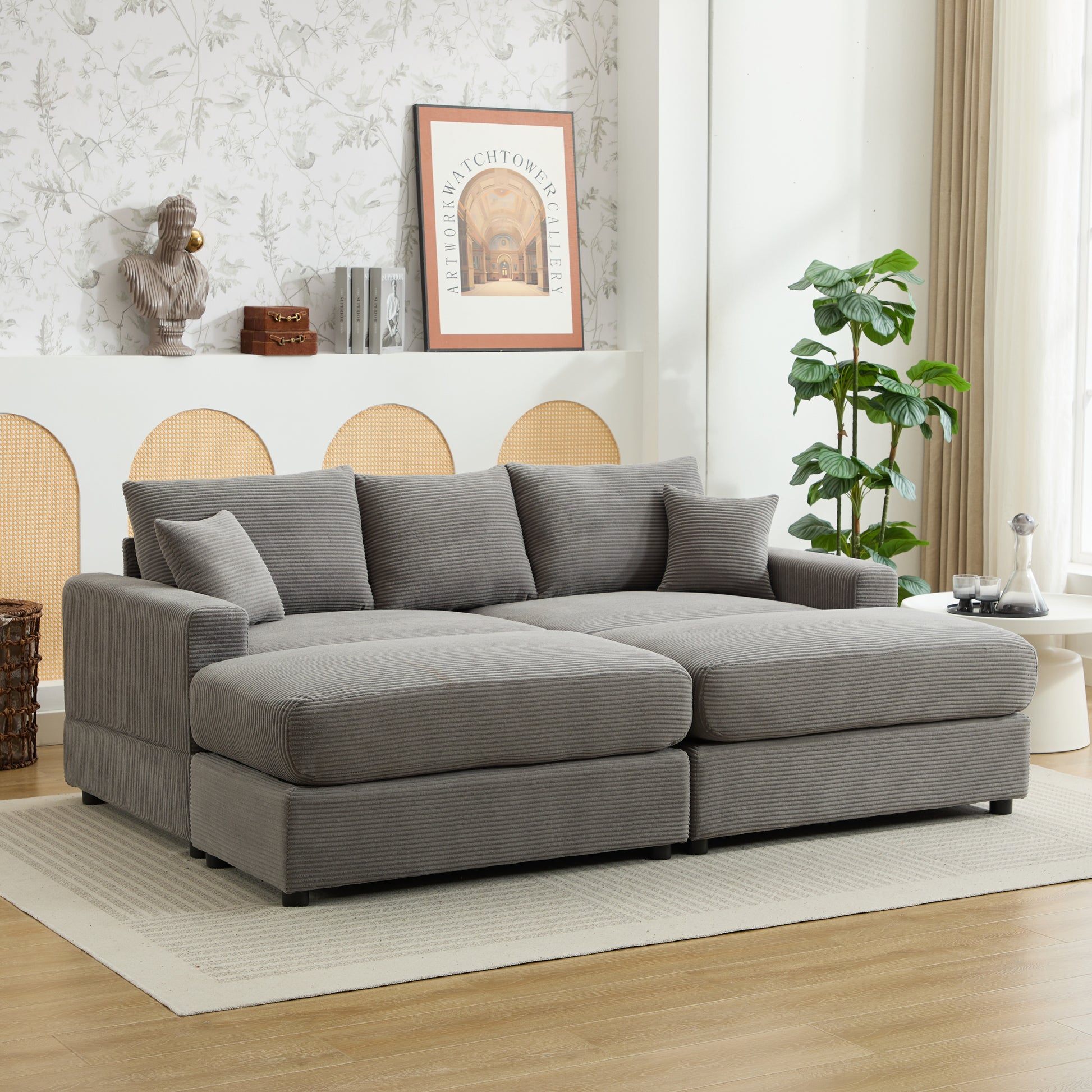 Gray corduroy sectional sofa with plush cushions and chaise lounge