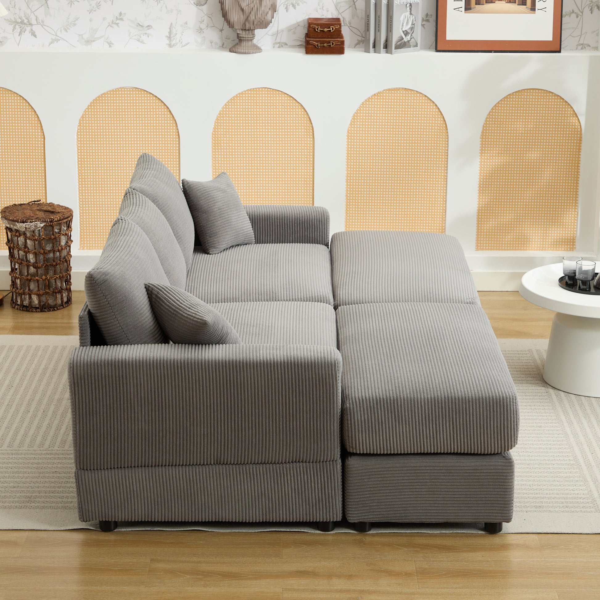 Plush grey corduroy sectional sofa with chaise lounge perfect for a modern living room