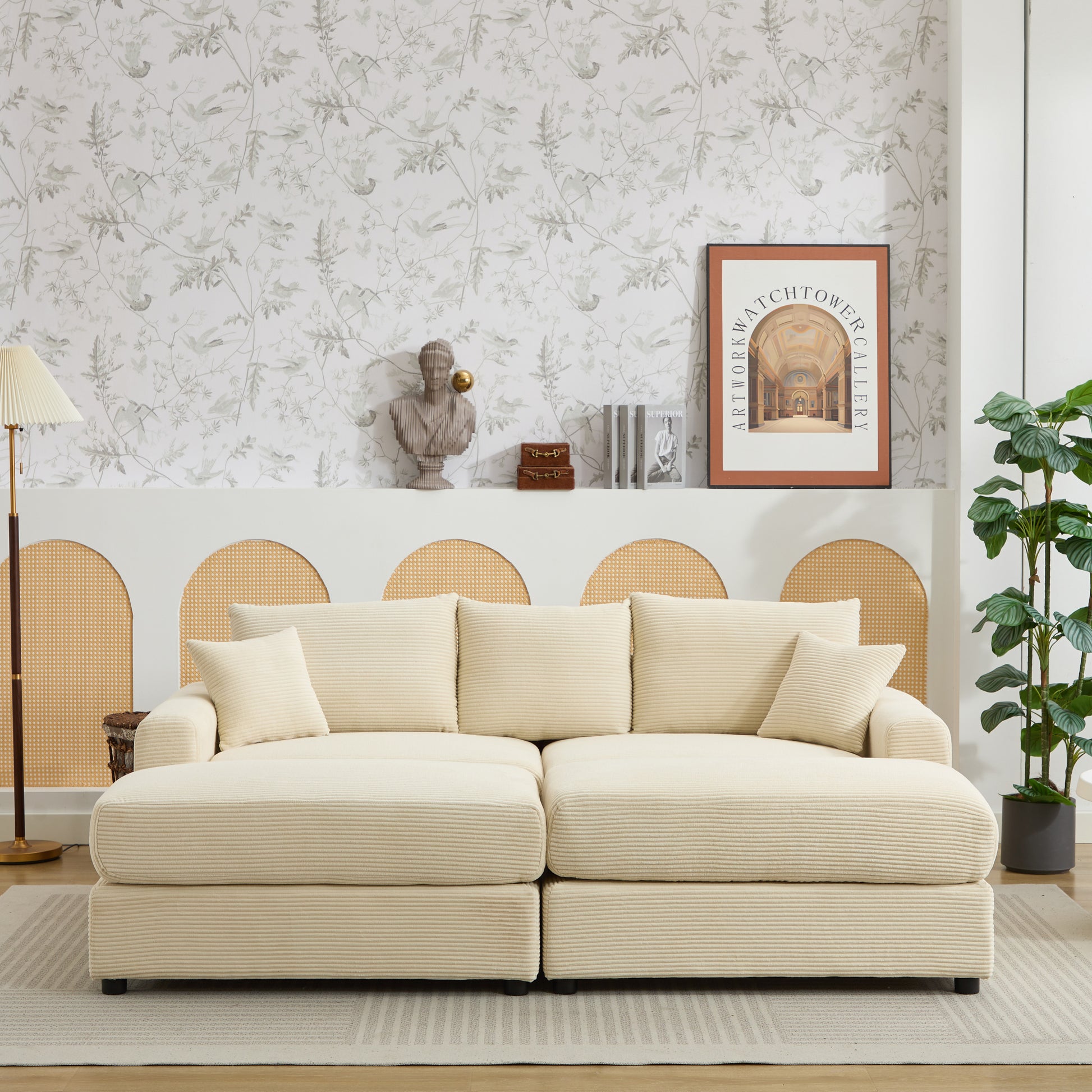 Plush cream corduroy sofa with matching accent pillows perfect for modern living room seating