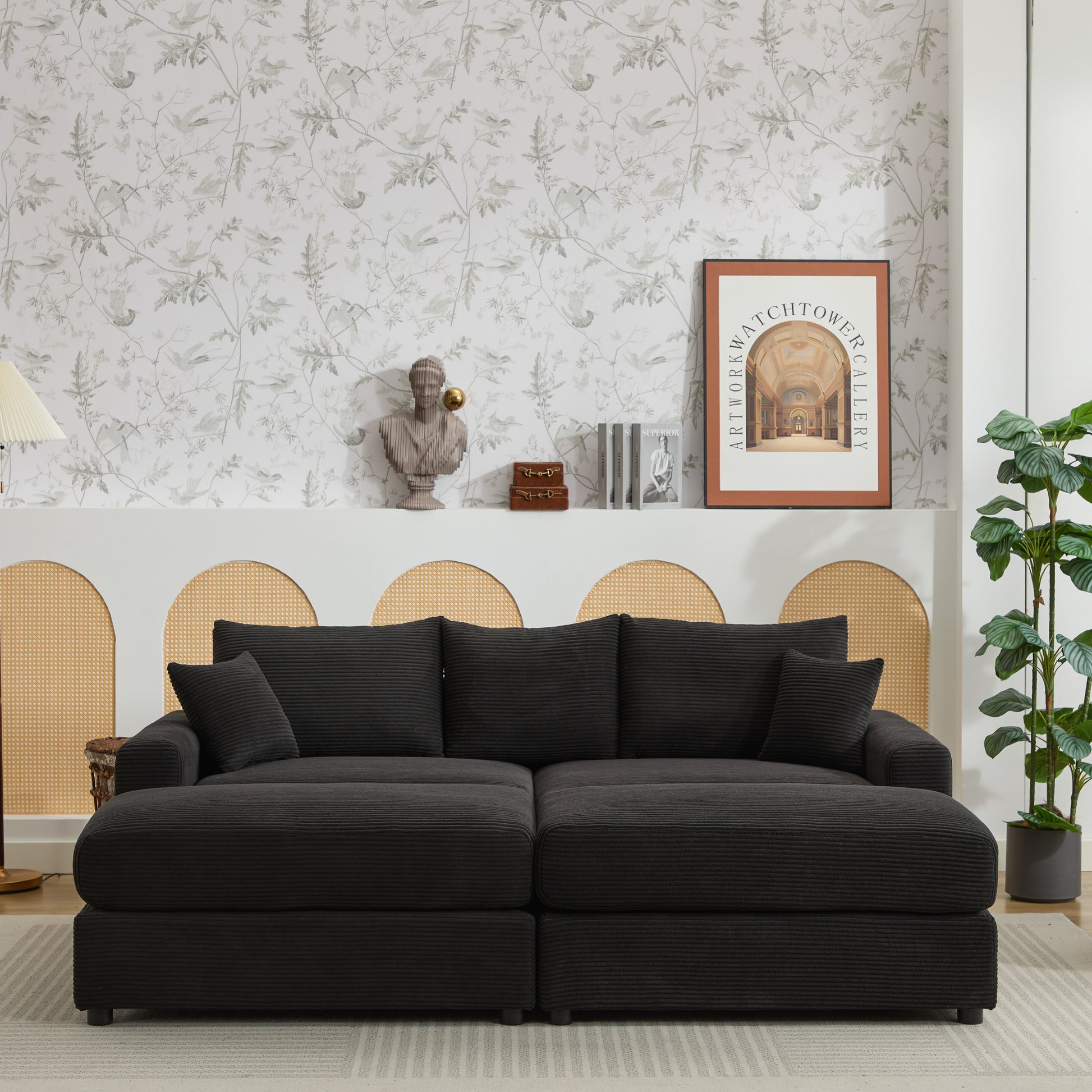Black corduroy sectional sofa with plush cushions and modern design