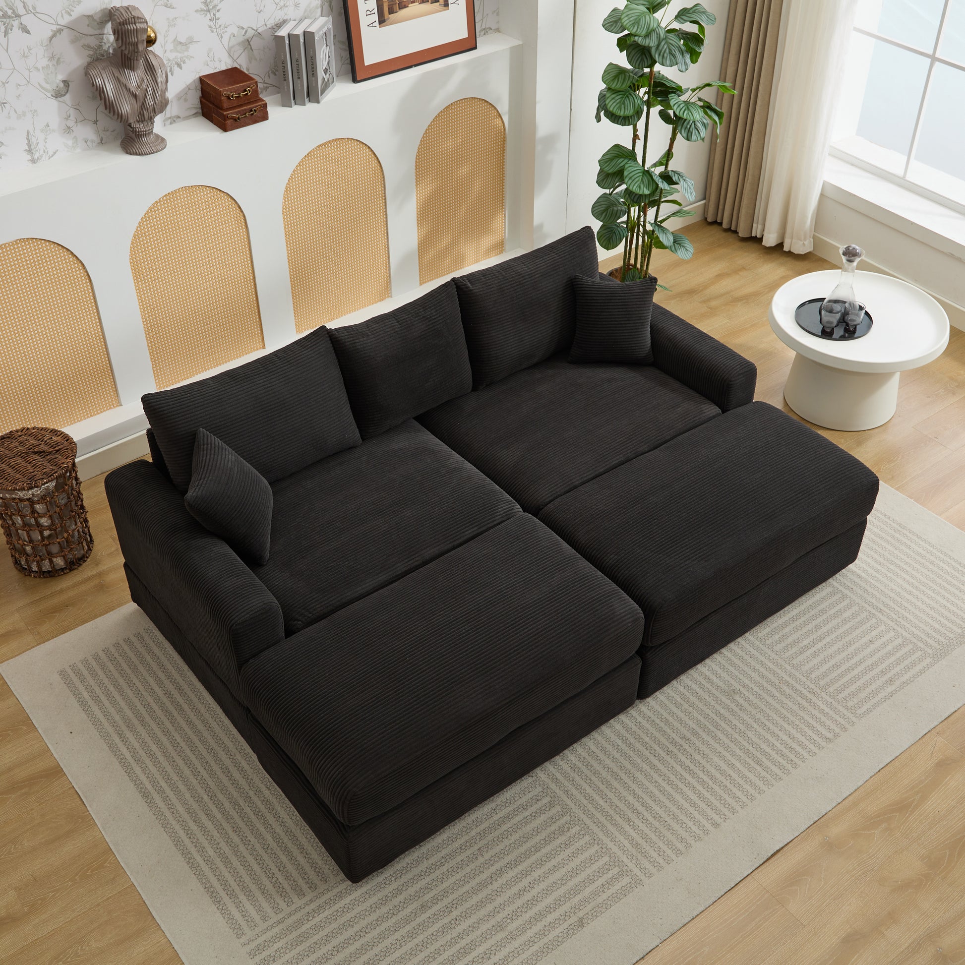 Dark grey corduroy sectional sofa with chaise and throw pillows