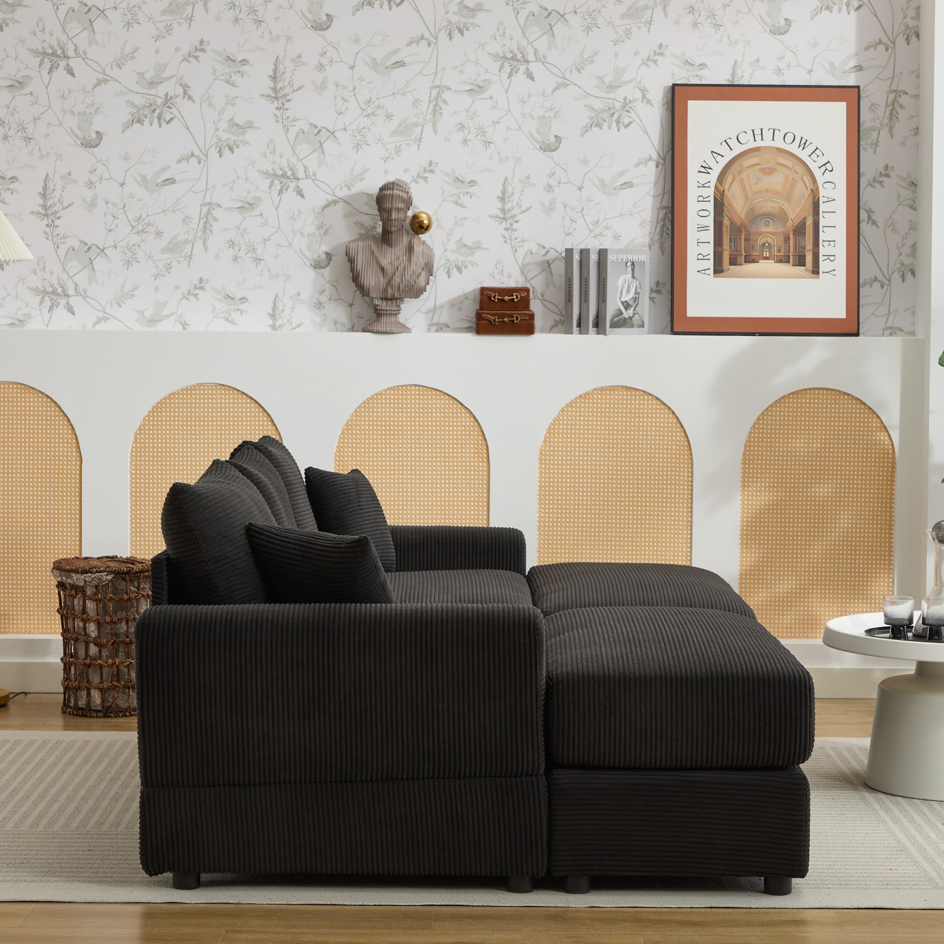 Dark gray corduroy sectional sofa with plush cushions and a chaise lounge attachment