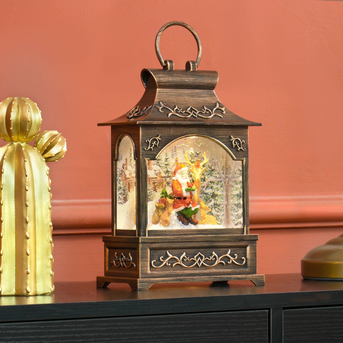 Bronze Santa Claus snow globe lantern with reindeer and foxes festive holiday decor