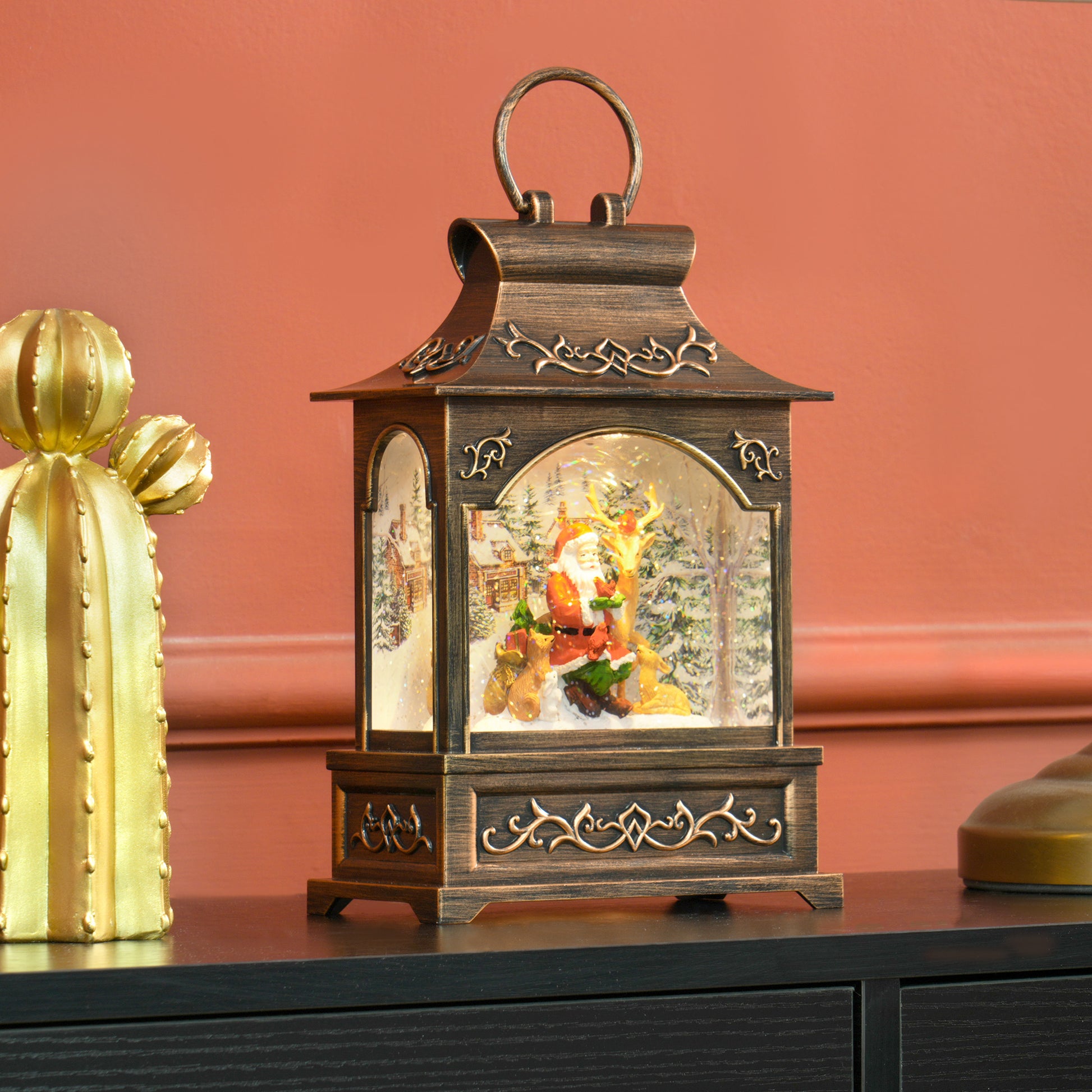 Bronze Santa Claus snow globe lantern with reindeer and foxes festive holiday decor
