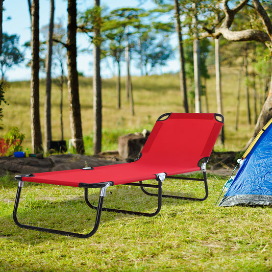 Red portable camping lounge chair with black metal frame set up on grass