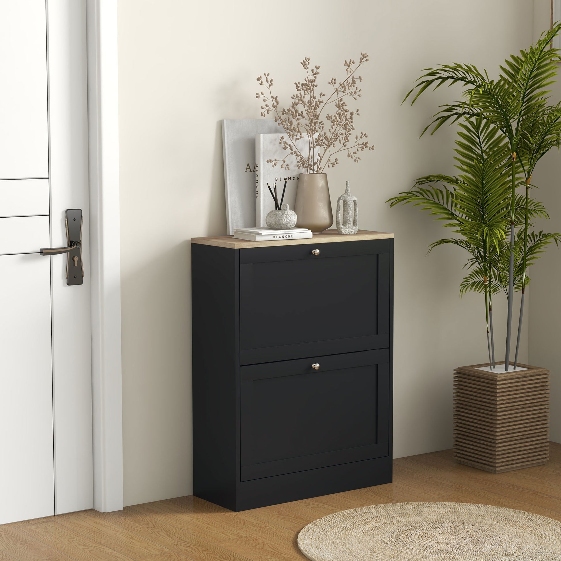 Black narrow shoe cabinet with two flipout doors and natural wood top for entryway storage