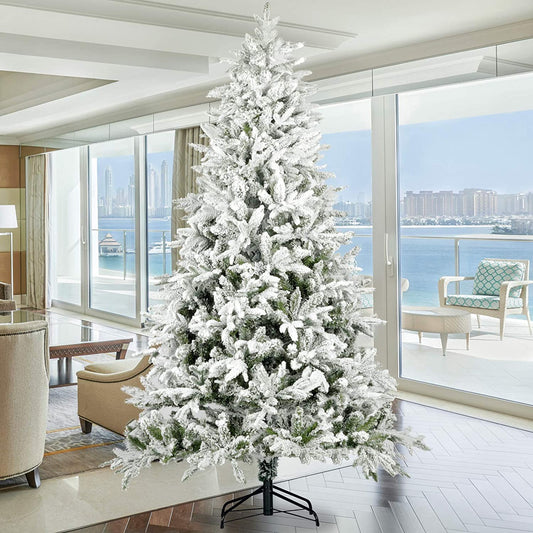 Flocked artificial Christmas tree with realistic flocked branches perfect for winter holiday decor