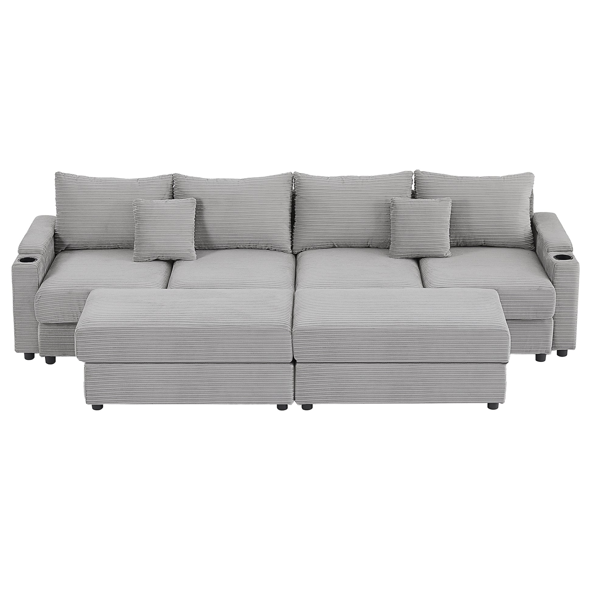 Grey corduroy sectional sofa with matching throw pillows and builtin cup holders
