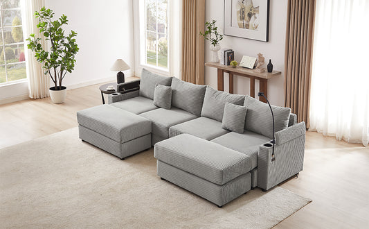 Gray corduroy sectional sofa with modular chaise and ottoman perfect for modern living rooms