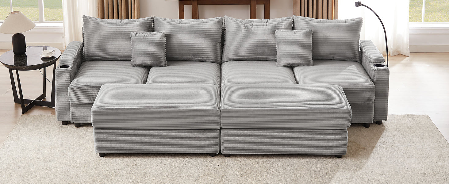 Grey corduroy sectional sofa with plush cushions and builtin cup holders