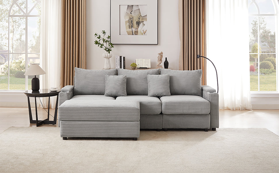 Gray corduroy sectional sofa with chaise and accent pillows
