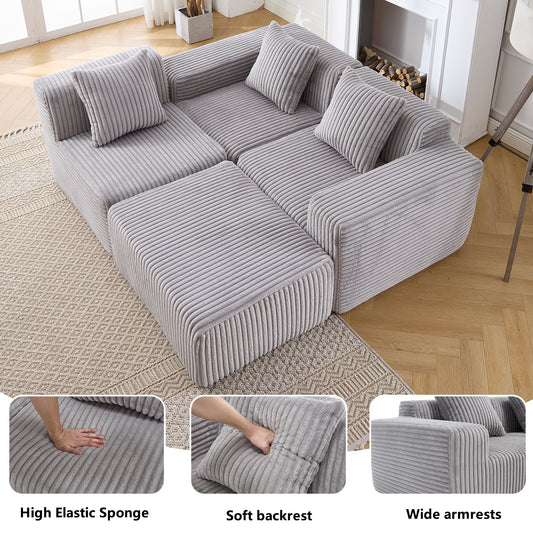 Gray corduroy modular sofa with plush cushions and wide armrests