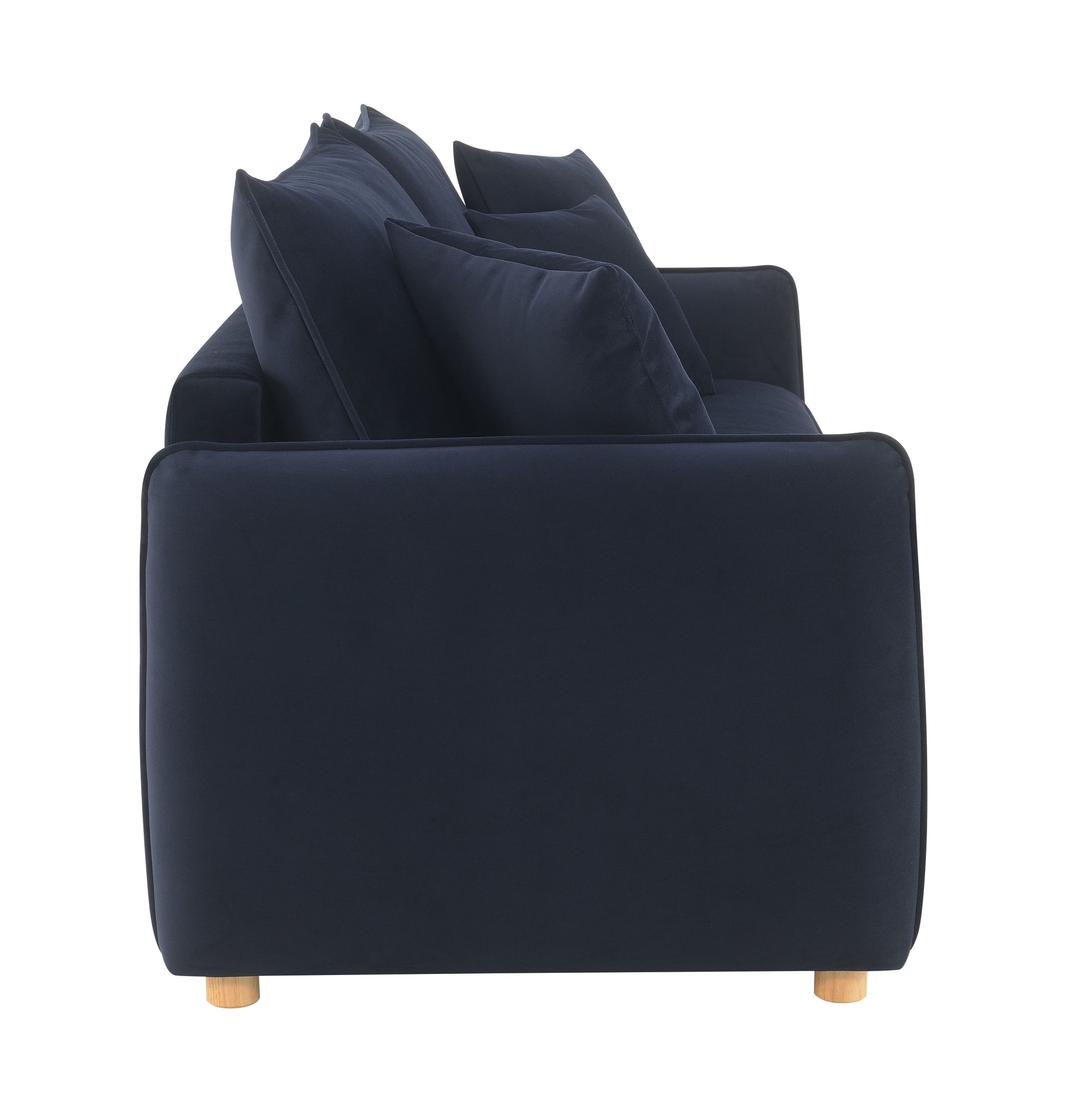 Deep navy velvet sofa with plush back cushions and sleek wooden legs