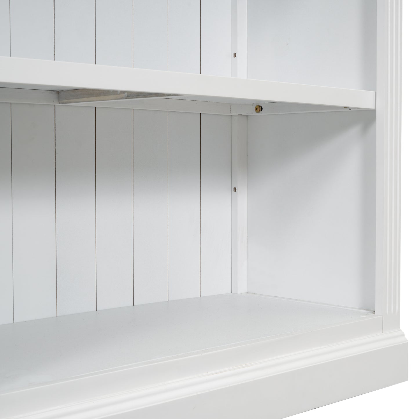 Closeup of white beadboard shelving unit interior showing clean lines and modern design