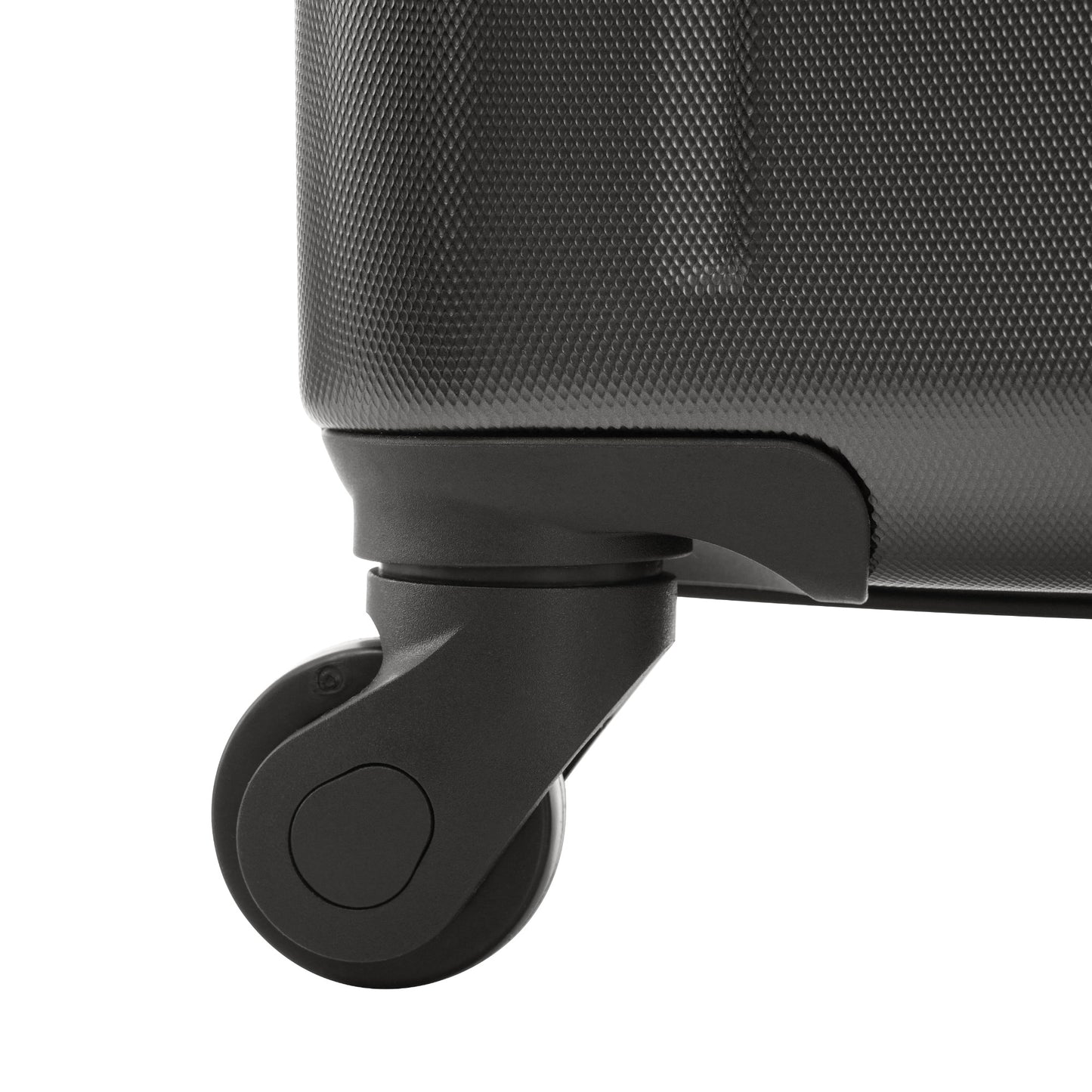 Closeup of a black hardshell suitcase with textured surface and a single spinner wheel