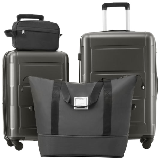 Charcoal grey expandable luggage set with black duffel bag and toiletry bag
