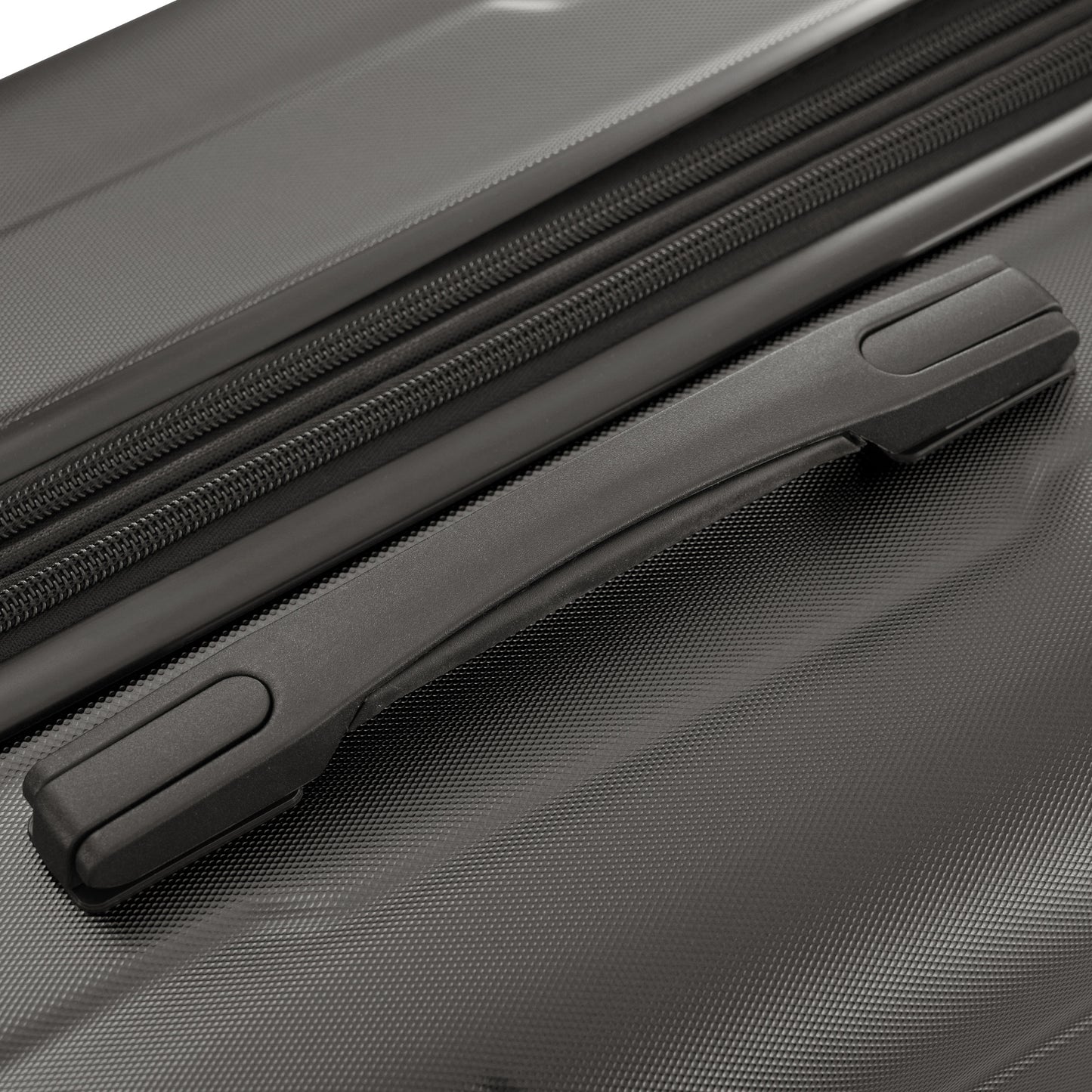 Black textured luggage with recessed carry handle and durable zipper detail
