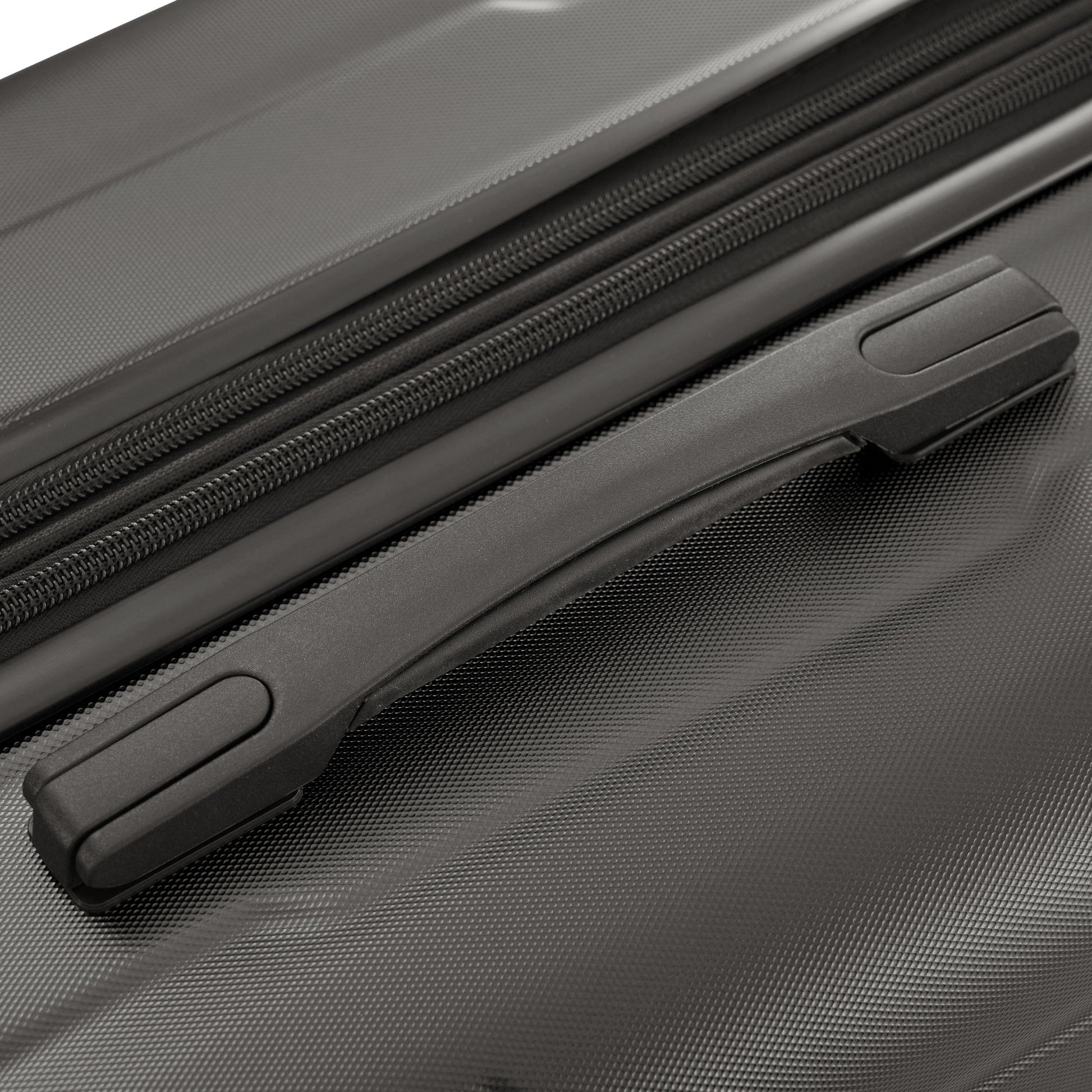 Black textured luggage with recessed carry handle and durable zipper detail