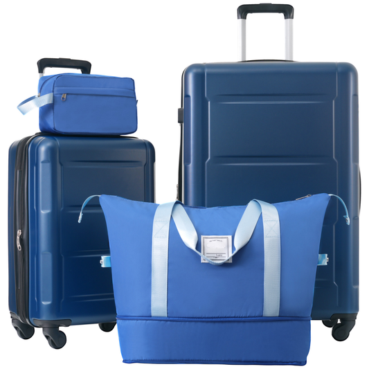 Navy blue hardshell luggage set with a duffel bag and toiletry case