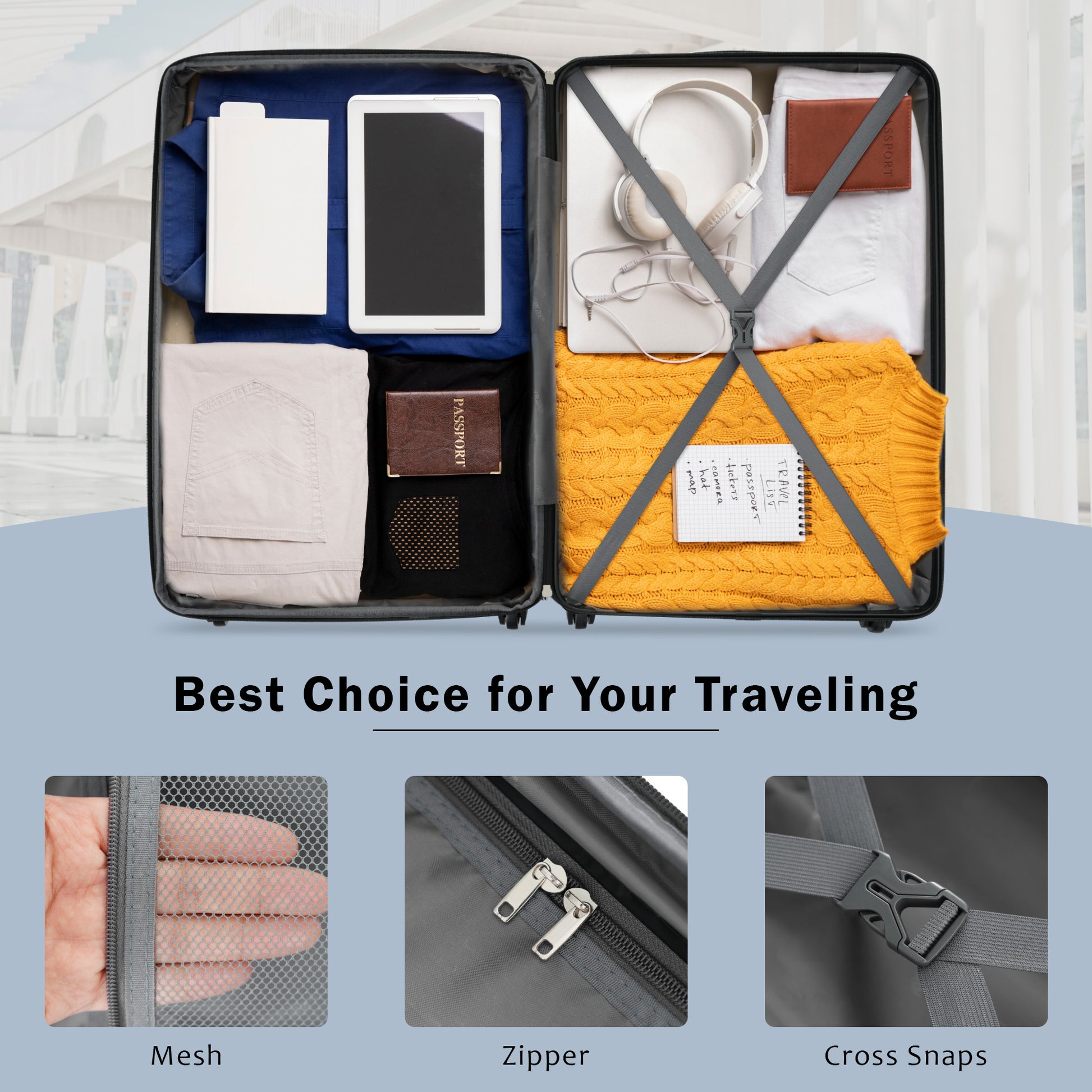 Open grey suitcase with organized travel essentials including clothes tablet and book