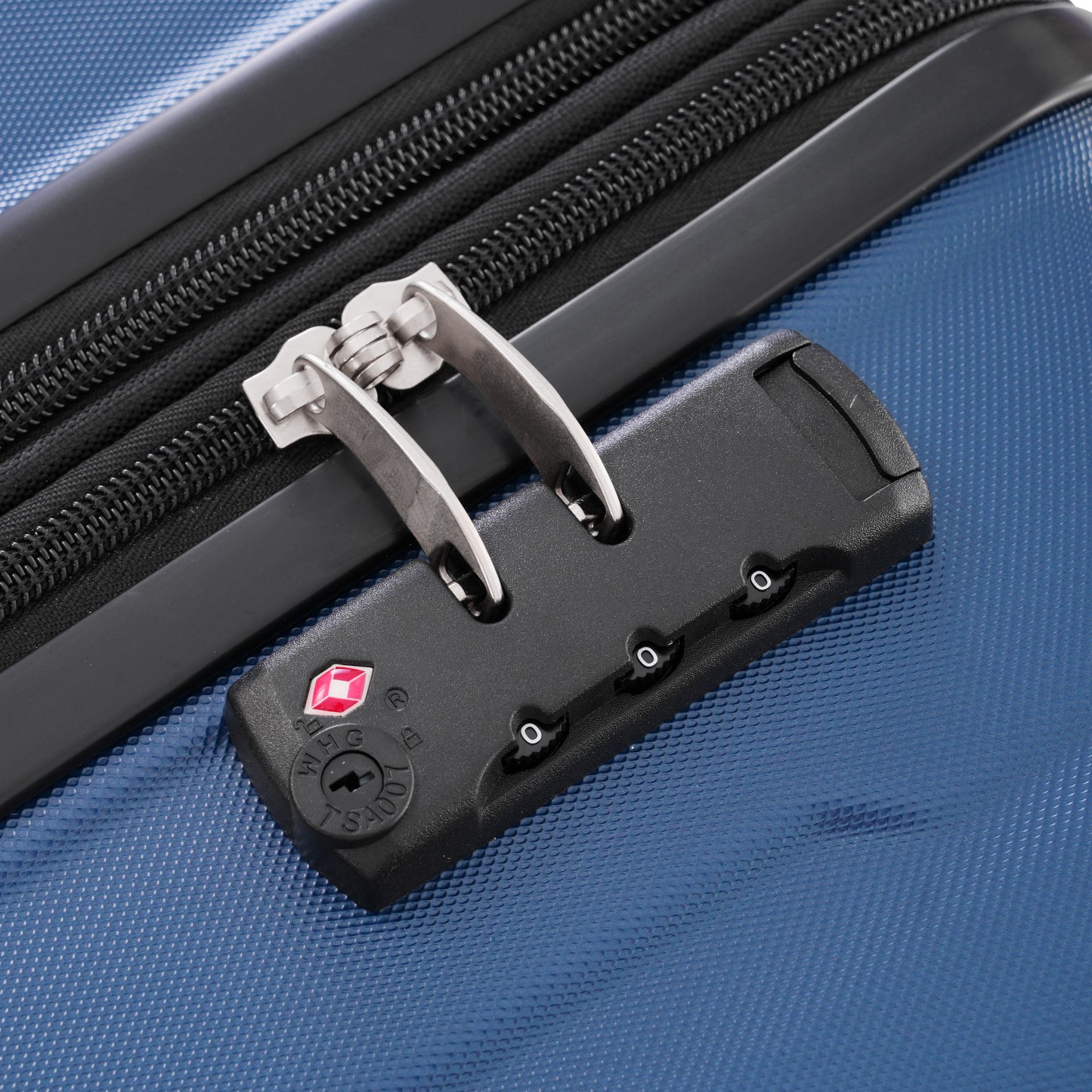 Blue hardshell luggage with integrated TSA lock and durable zipper detail