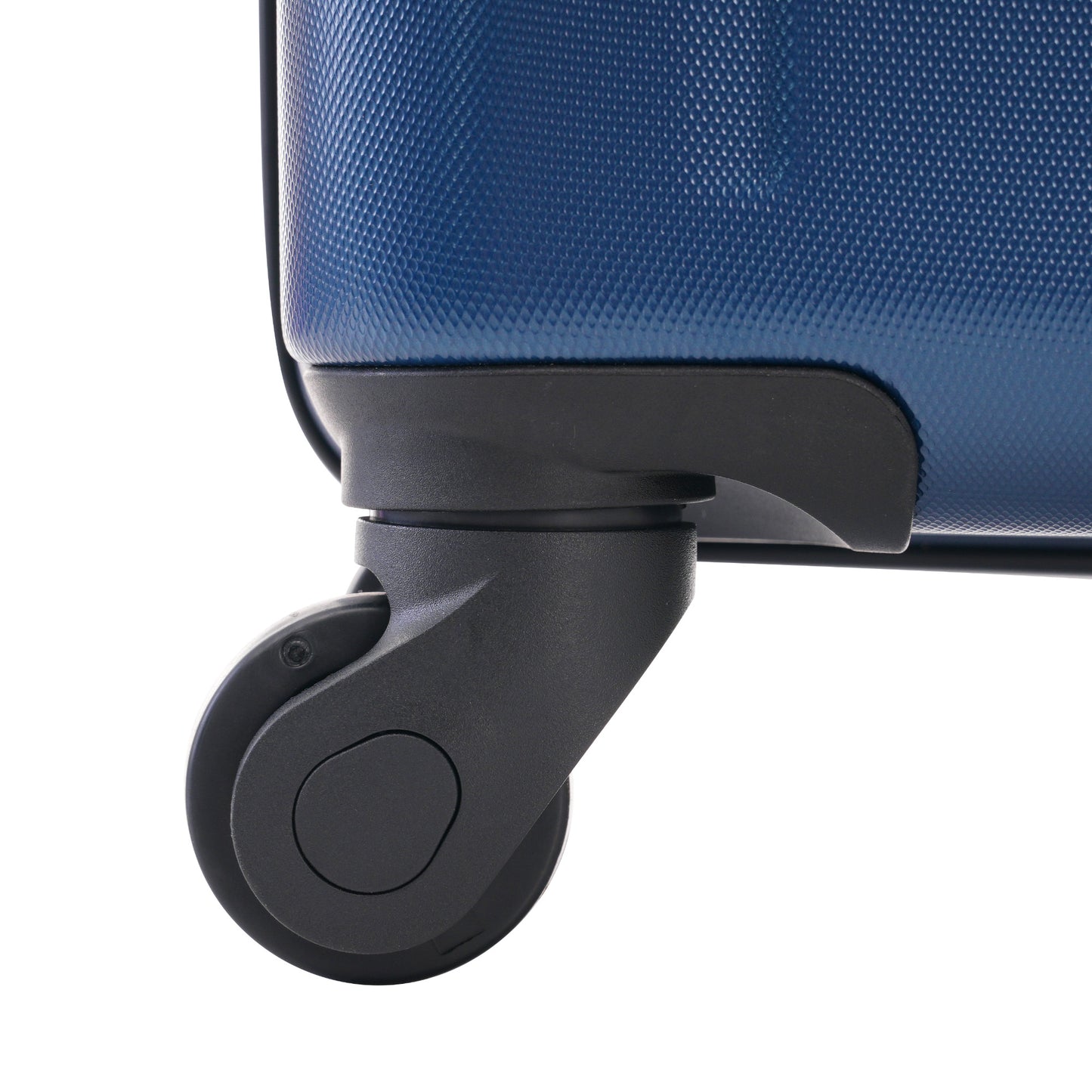 Closeup of a navy blue textured hardshell suitcase wheel for travel