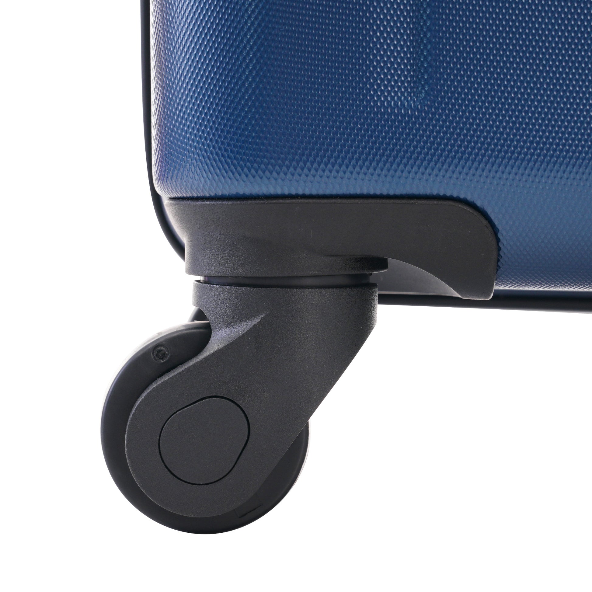 Closeup of a navy blue textured hardshell suitcase wheel for travel