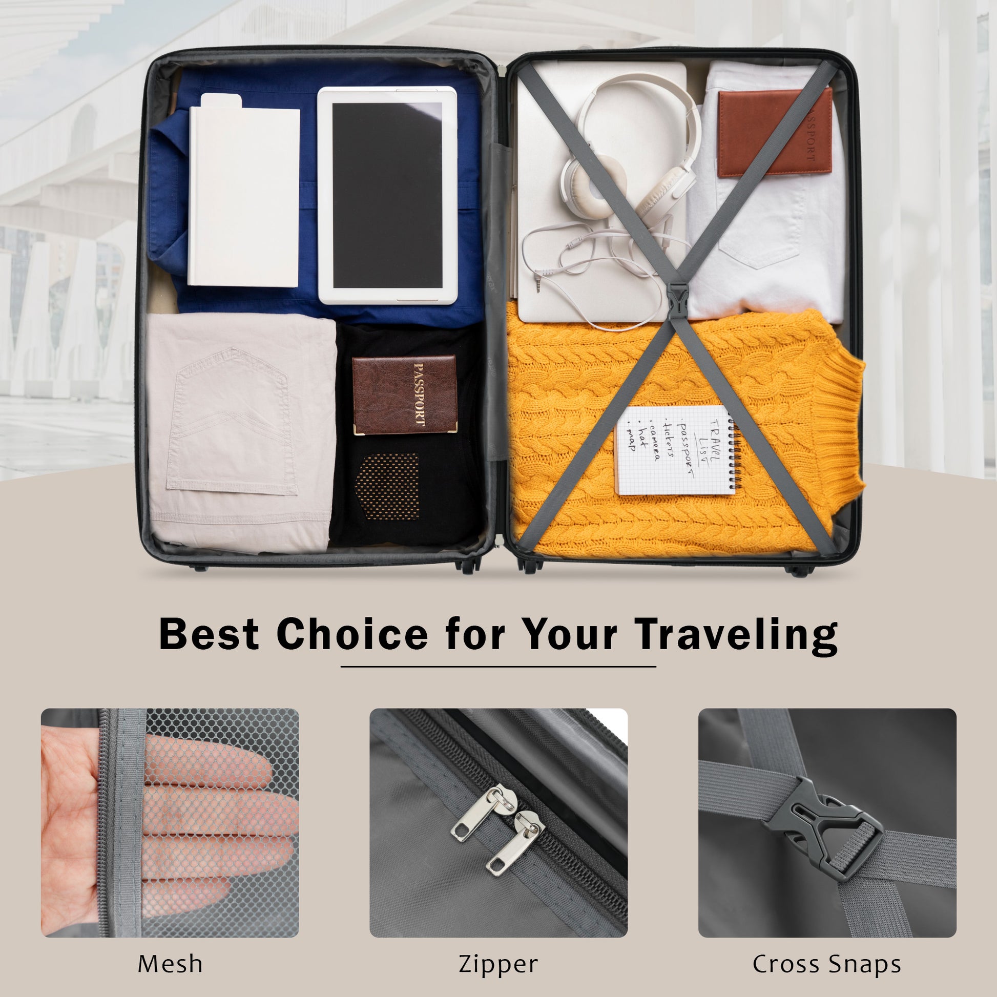 Open gray suitcase packed with clothing a tablet and headphones