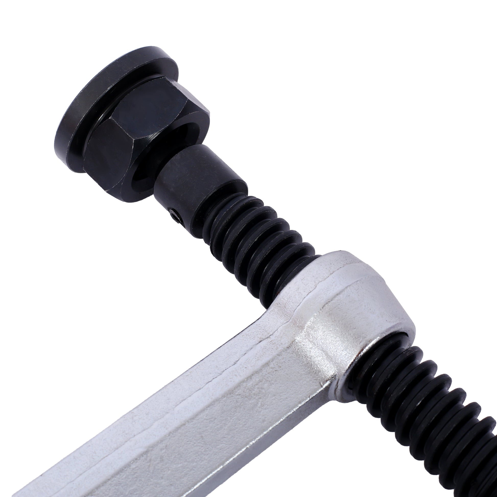 Closeup of a heavyduty Cclamp with a silver metal frame and black screw mechanism