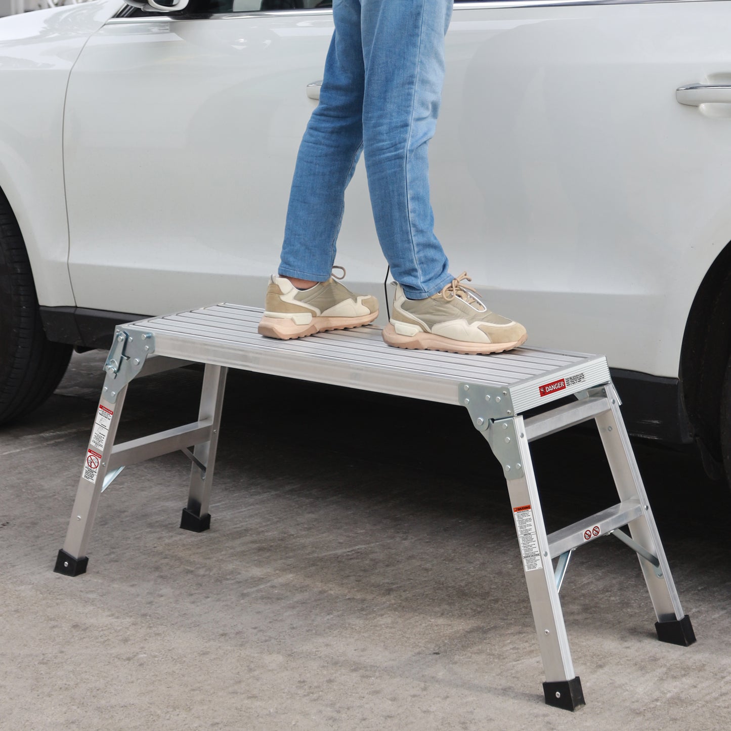 Silver aluminum step stool with nonslip feet perfect for car detailing