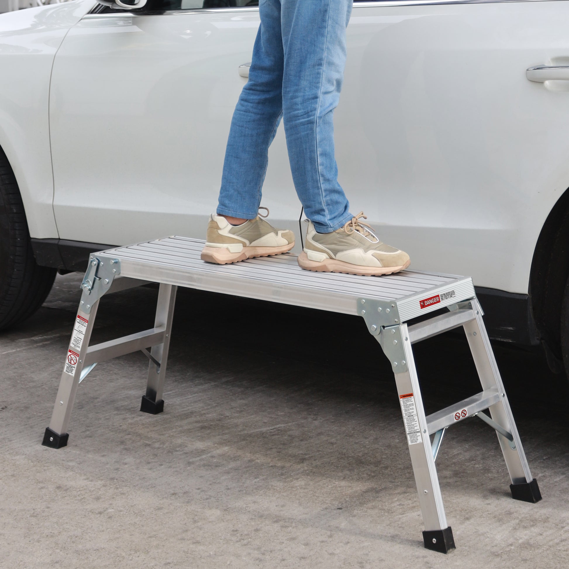 Silver aluminum step stool with nonslip feet perfect for car detailing