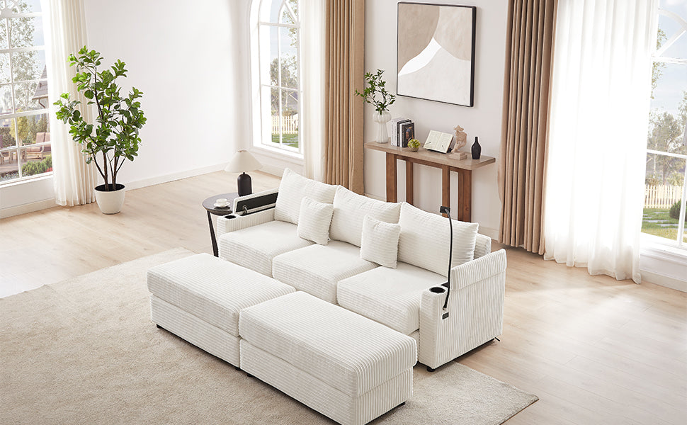 Modular white corduroy sofa with plush cushions and integrated cup holders