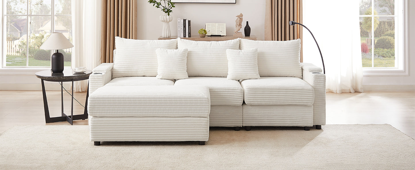 Plush ivory corduroy sectional sofa with chaise lounge and matching throw pillows