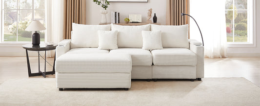 Plush ivory corduroy sectional sofa with chaise lounge and matching throw pillows