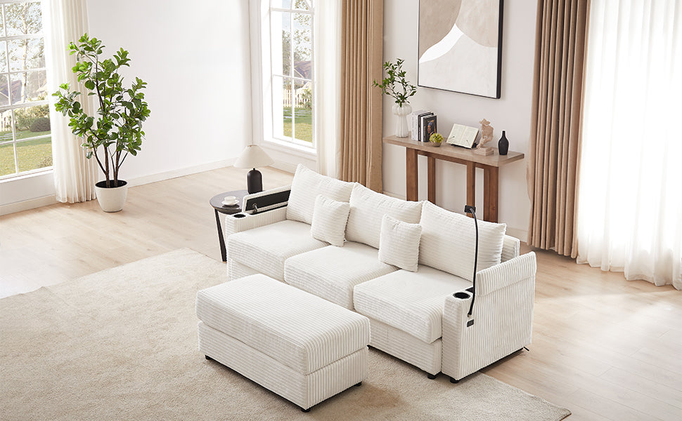 Comfortable white corduroy sectional sofa with plush throw pillows and ottoman