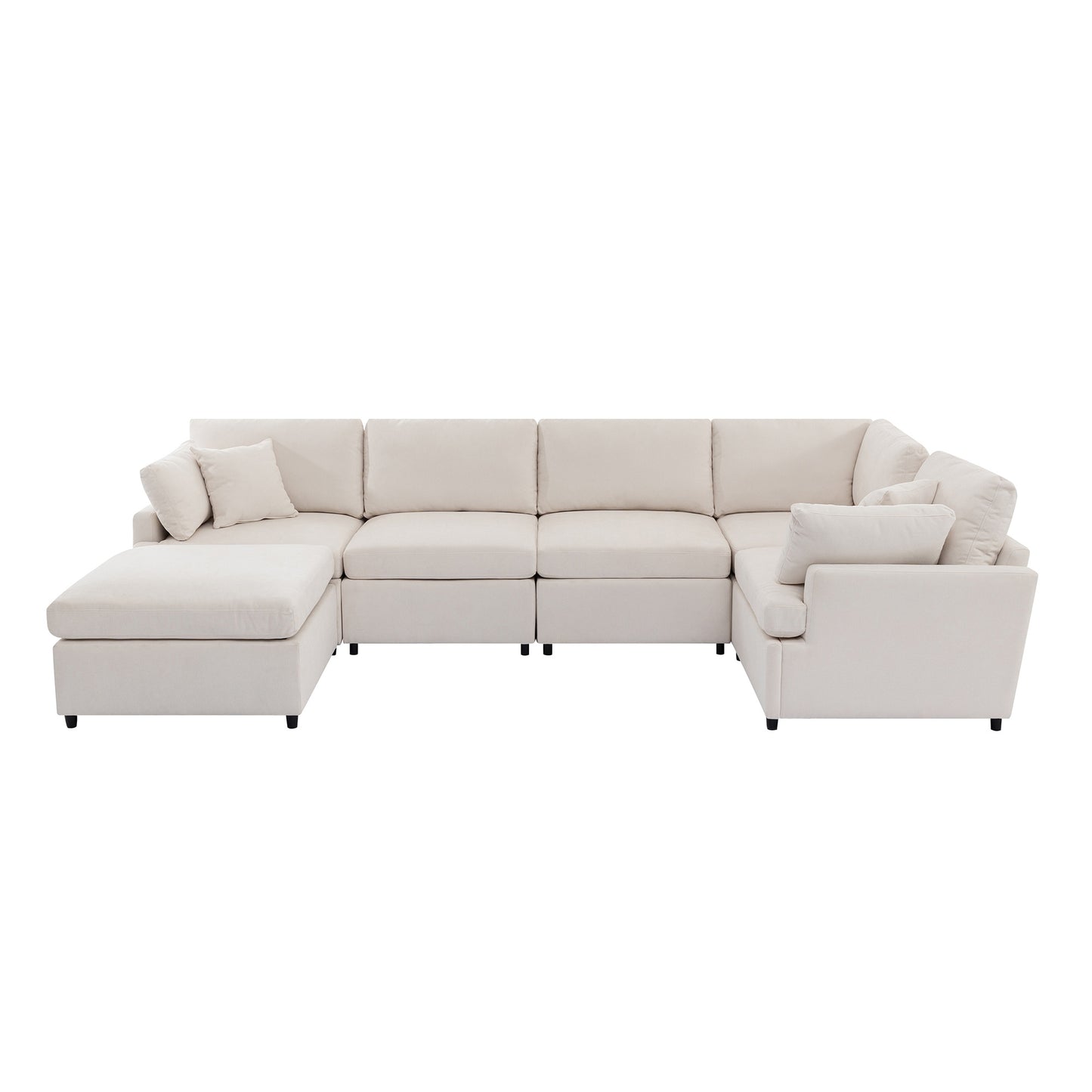 Modular cream fabric sectional sofa with chaise and accent pillows for a spacious living room