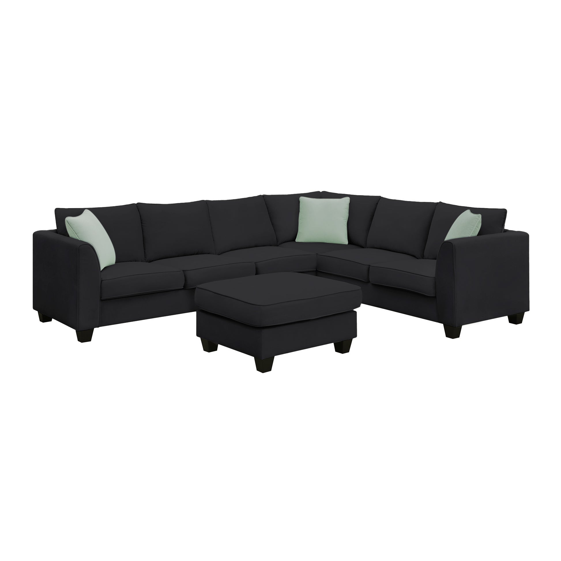 Dark grey fabric sectional sofa with light mint green accent pillows and matching ottoman
