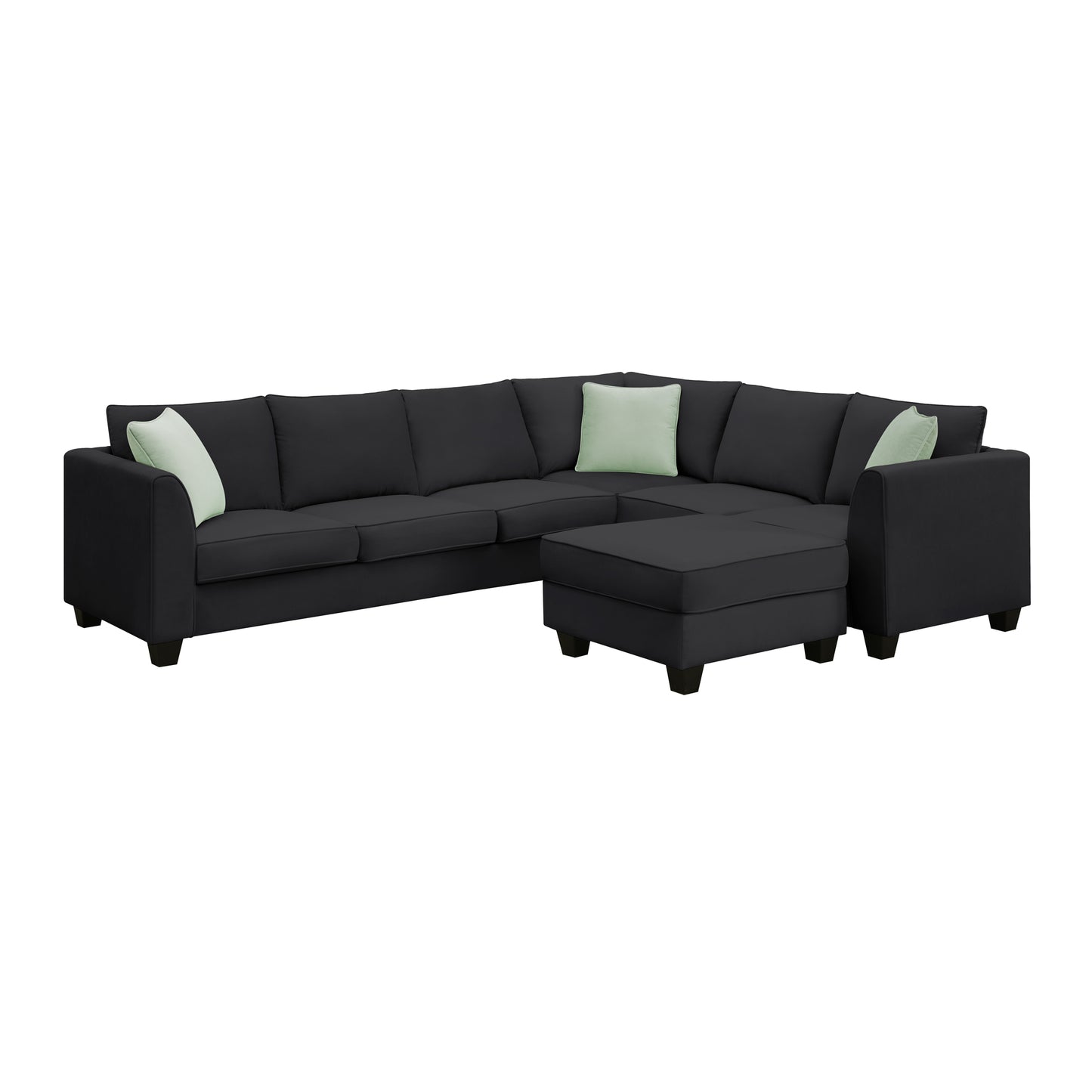 Dark grey sectional sofa with light green accent pillows and matching ottoman fabric upholstery