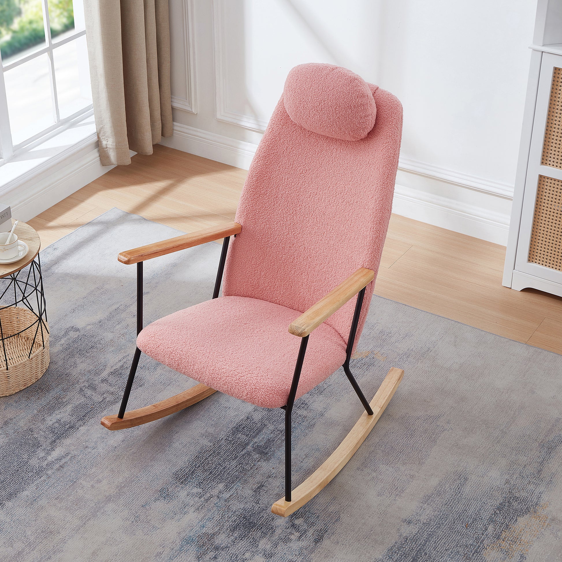 Plush pink teddy bear fabric rocking chair with wooden arms and black metal legs