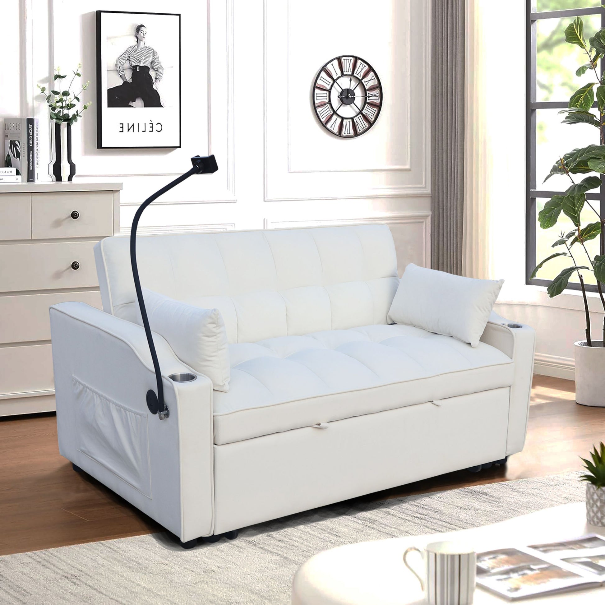 White tufted futon sofa with side pockets and cup holders ideal for small living spaces