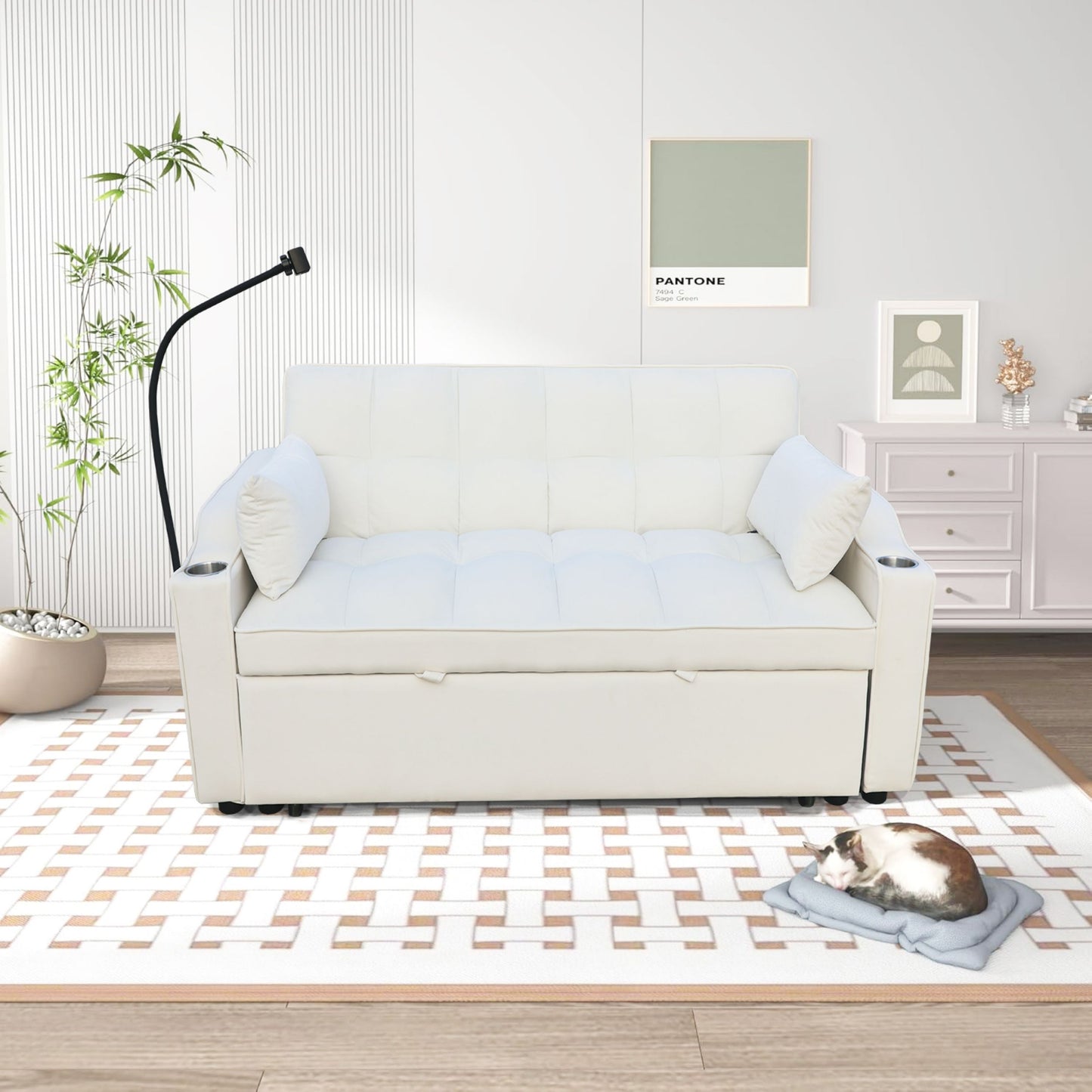 Comfortable white tufted sofa bed with builtin cup holders for living room