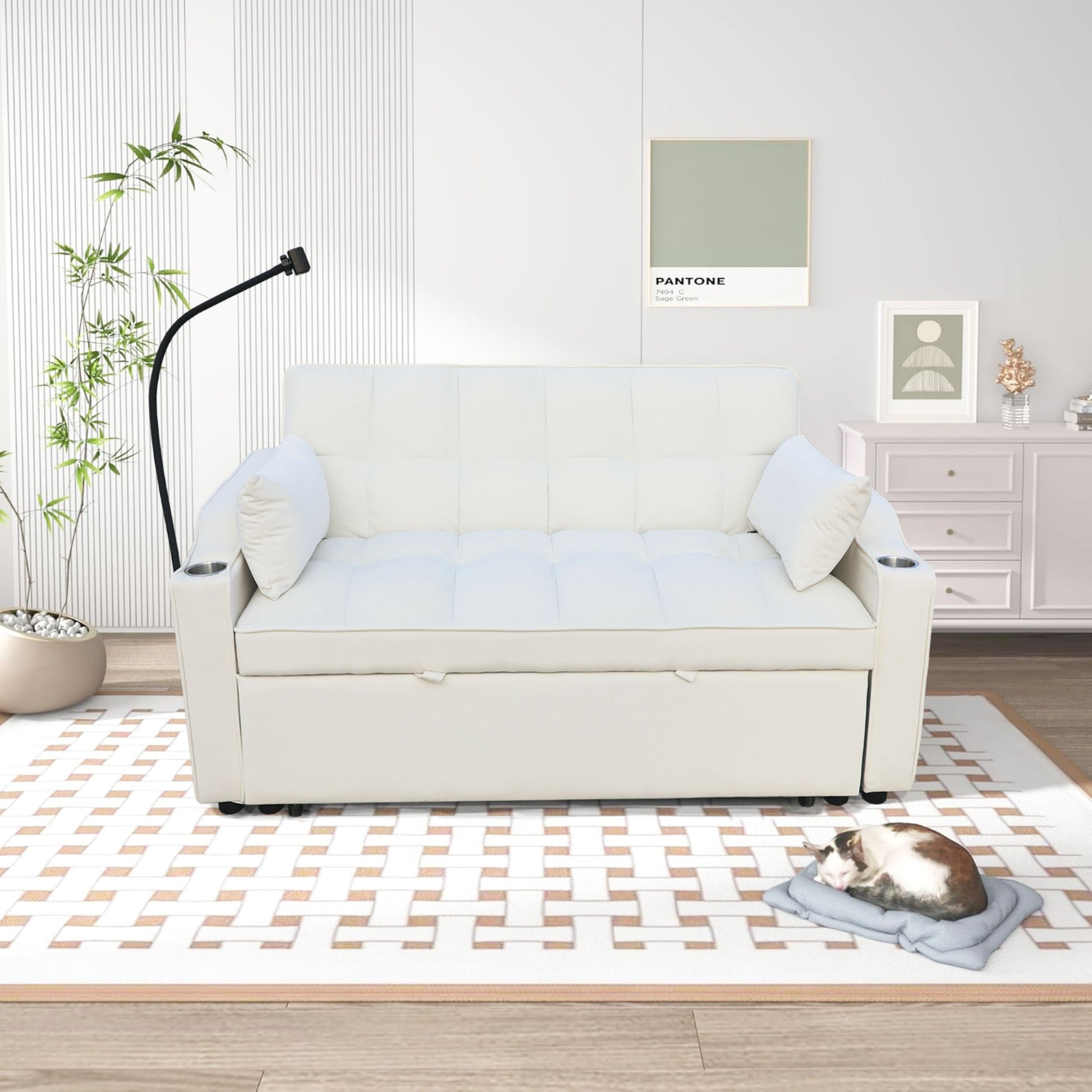 Comfortable white tufted sofa bed with builtin cup holders for living room