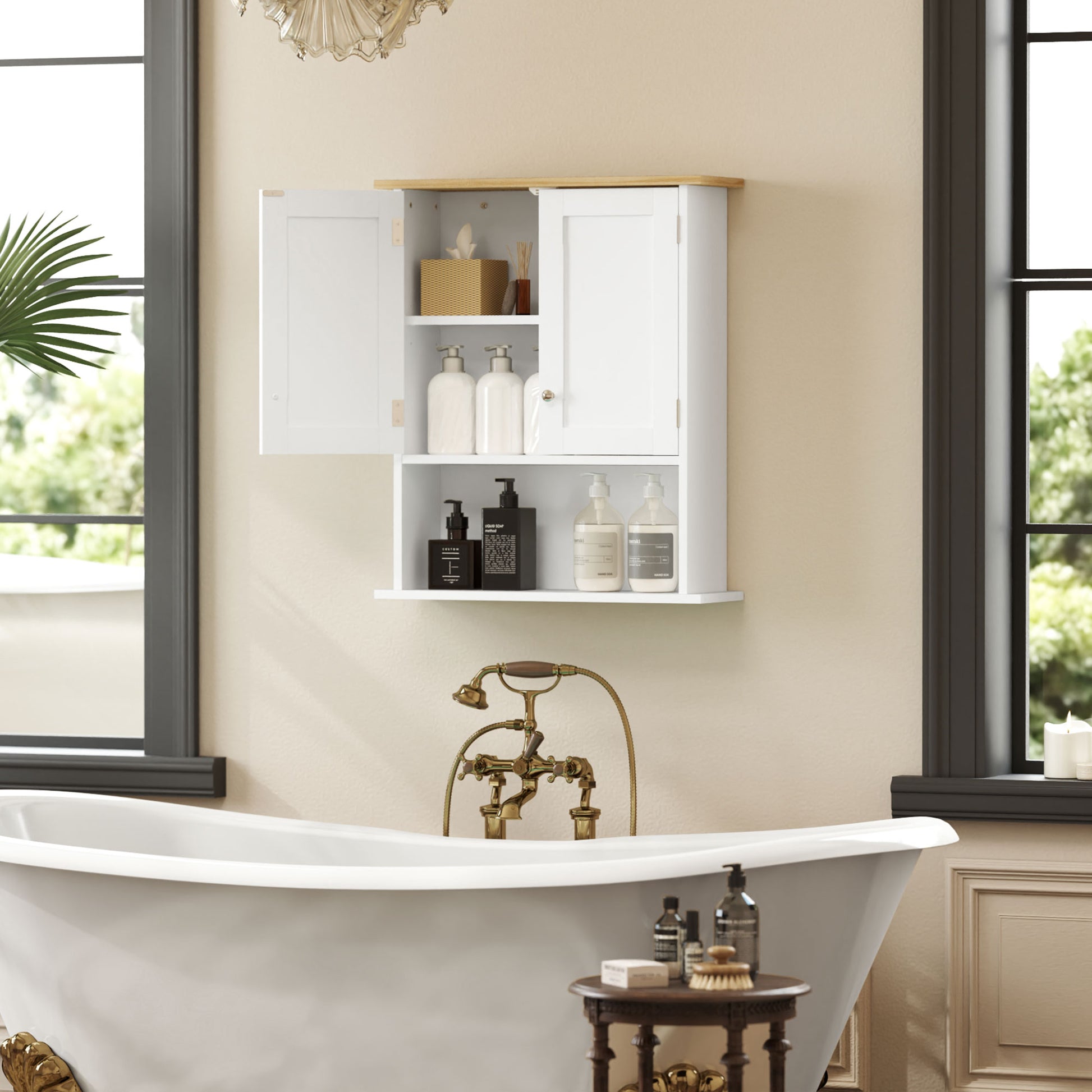 White farmhouse style medicine cabinet with two doors wood top and open shelf storing bath essentials