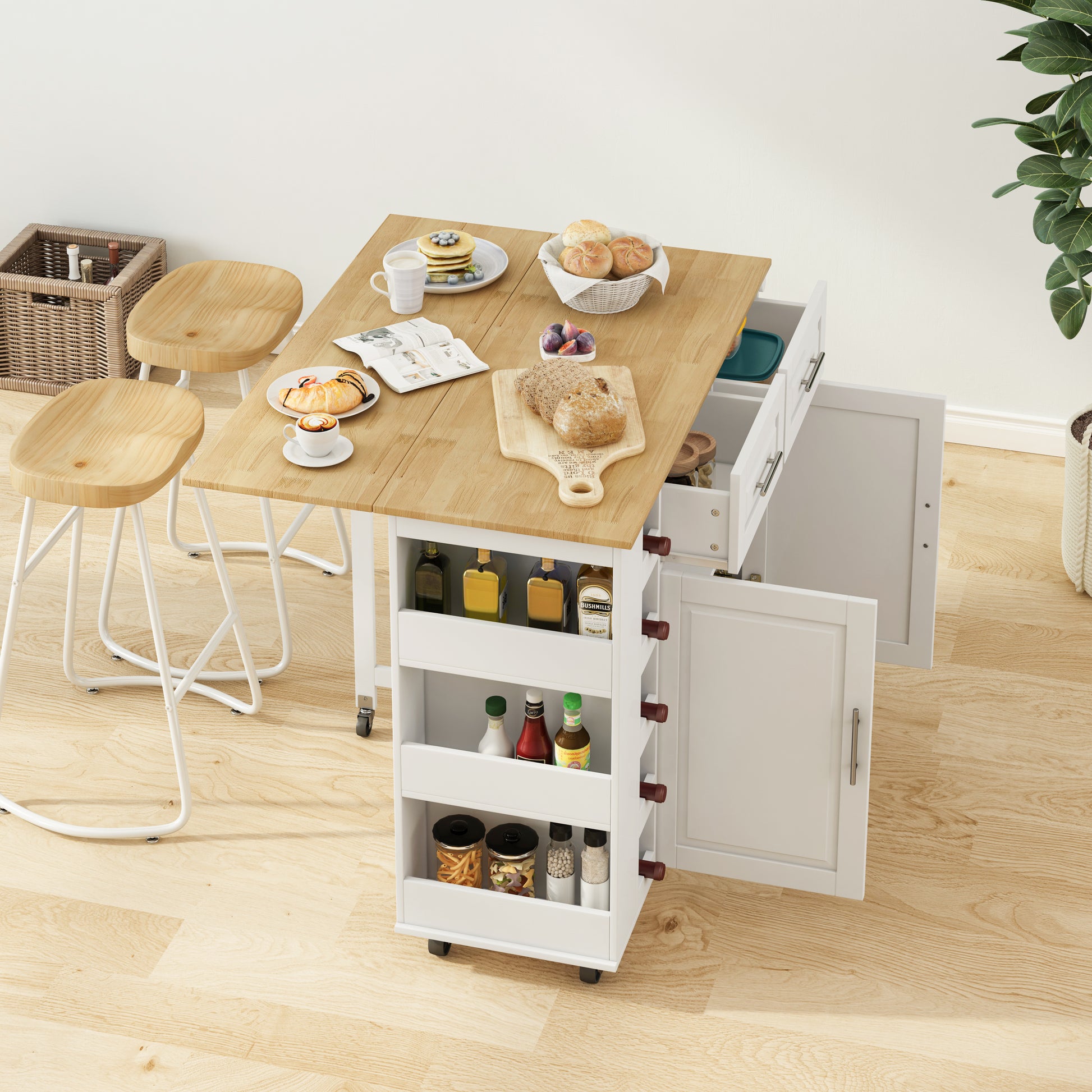White rolling kitchen island with drop leaf table and storage