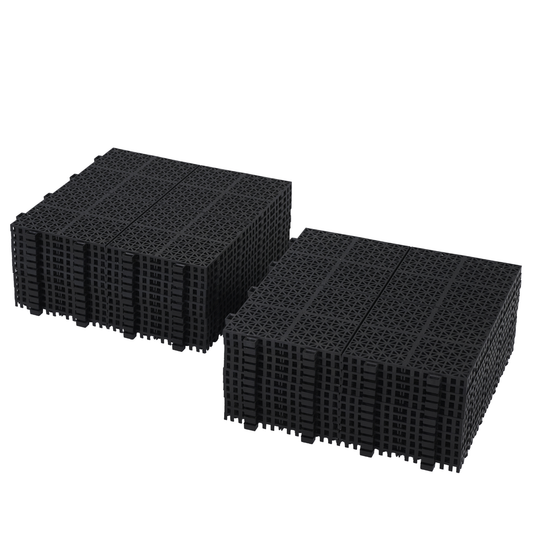 Two stacks of black interlocking modular floor tiles with open grid design