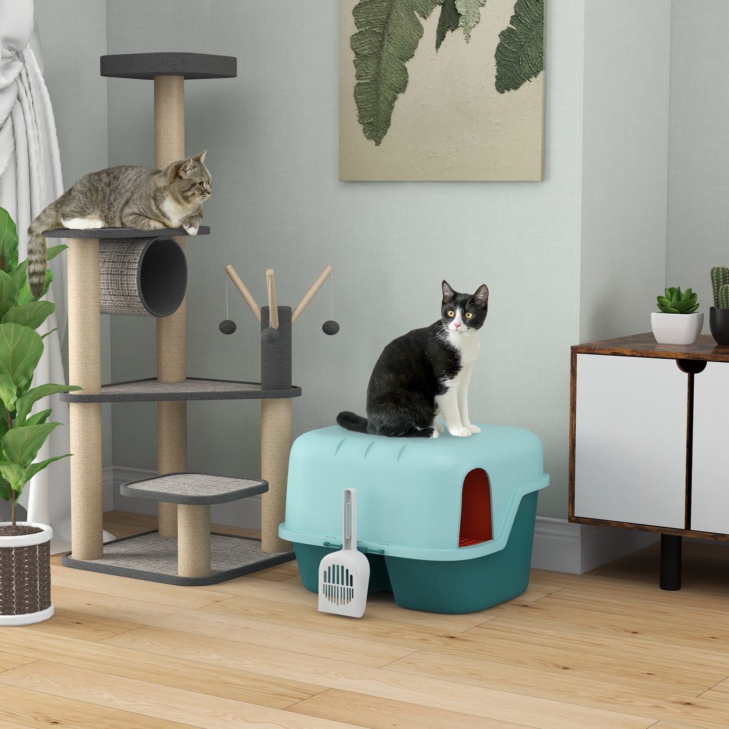 Grey tabby cat resting on a multilevel cat tree with sisal scratching posts
