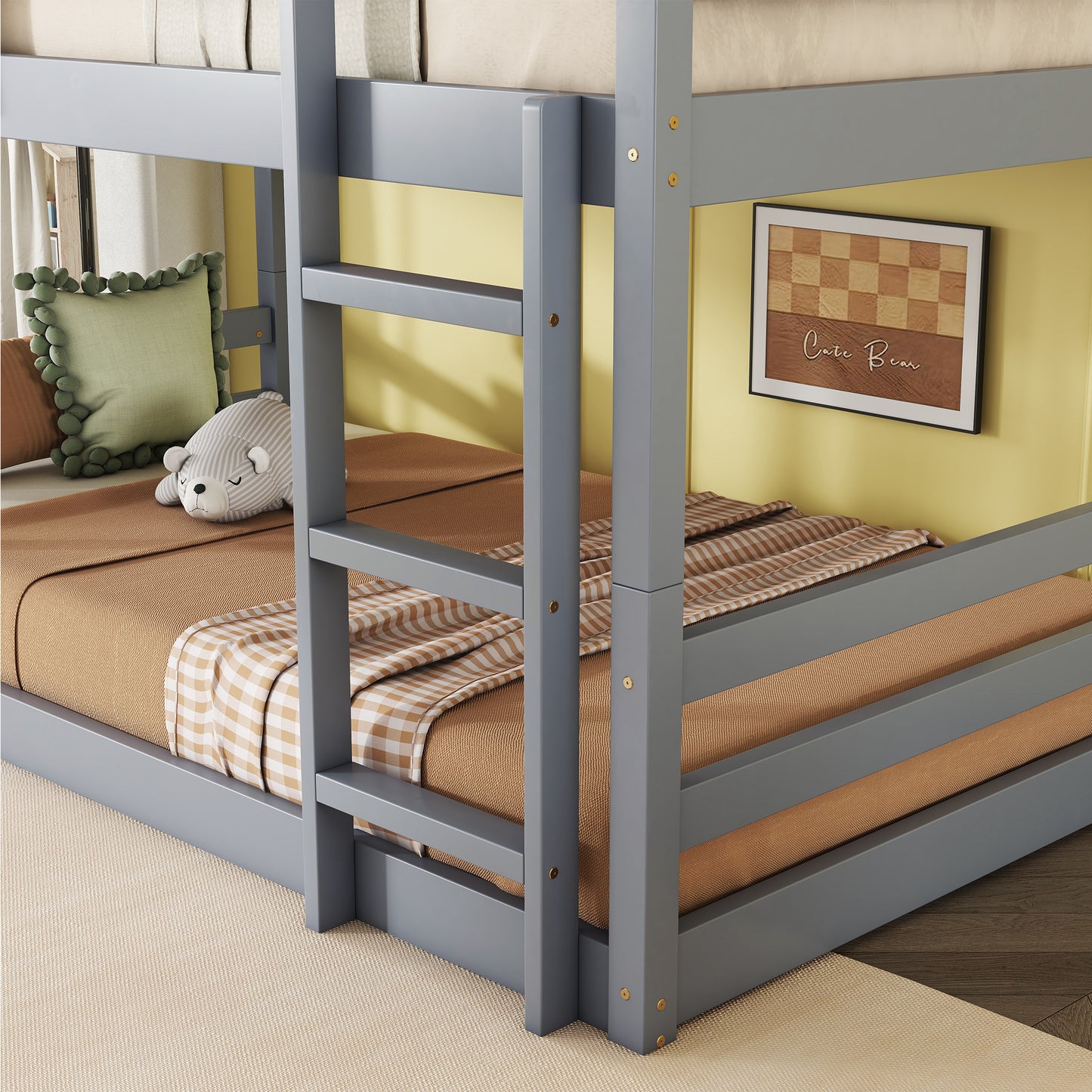 Gray twin over twin bunk bed with checkerboard bedding